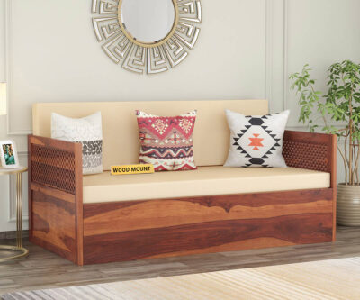 Elegant solid wood sofa cum bed with plush cushions, sturdy frame, and space-saving design by wood mount