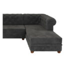 Luxurious Payne's Grey Velvet Chesterfield sofa with deep button tufting, rolled arms, and nailhead trim, adding a classic touch to a living room.