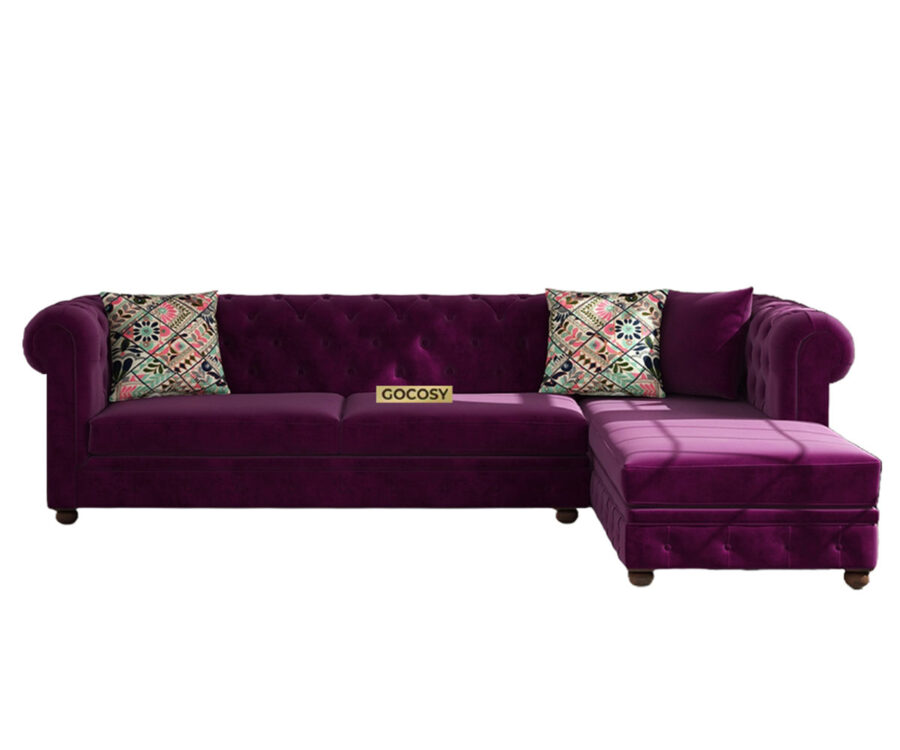 Luxurious Wine Red Velvet Chesterfield sofa with deep button tufting, rolled arms, and nailhead trim, adding a classic touch to a living room.