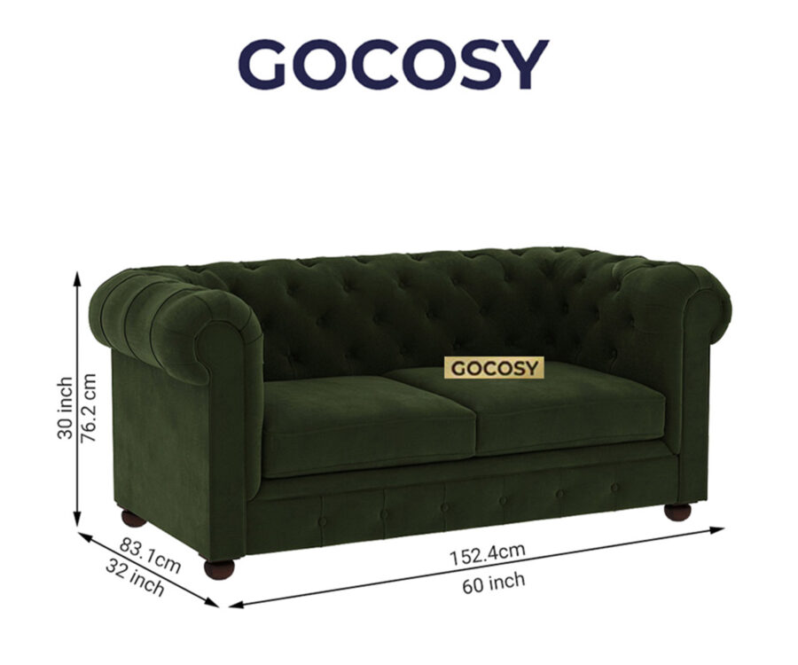 Luxurious Dark Forest Green Chesterfield sofa with deep button tufting, rolled arms, and nailhead trim, adding a classic touch to a living room.