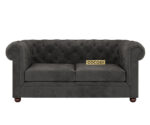 Luxurious Payne's Grey Velvate Chesterfield sofa with deep button tufting, rolled arms, and nailhead trim, adding a classic touch to a living room.