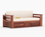 Elegant solid wood sofa cum bed with plush cushions, sturdy frame, and space-saving design by wood mount