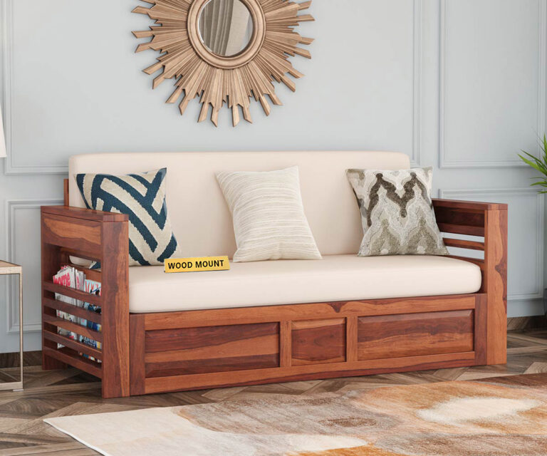 Elegant solid wood sofa cum bed with plush cushions, sturdy frame, and space-saving design by wood mount