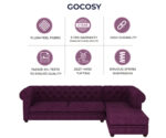 Luxurious Wine Red Velvet Chesterfield sofa with deep button tufting, rolled arms, and nailhead trim, adding a classic touch to a living room.