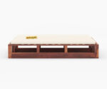 Elegant solid wood sofa cum bed with plush cushions, sturdy frame, and space-saving design by wood mount