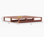 Elegant solid wood sofa cum bed with plush cushions, sturdy frame, and space-saving design by wood mount