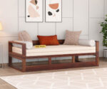 Elegant solid wood sofa cum bed with plush cushions, sturdy frame, and space-saving design by wood mount