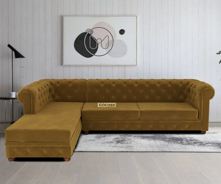 Luxurious Hunyadi Yellow Velvate Chesterfield sofa with deep button tufting, rolled arms, and nailhead trim, adding a classic touch to a living room.